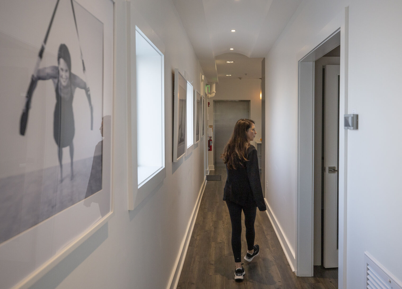 Longevity Club Owner Jennie In Hall.JPG